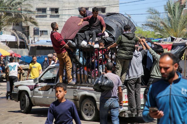 <p>Palestinians desperately try to flee the southern Gaza city of Rafah as Israel prepares for an offensive in the region </p>