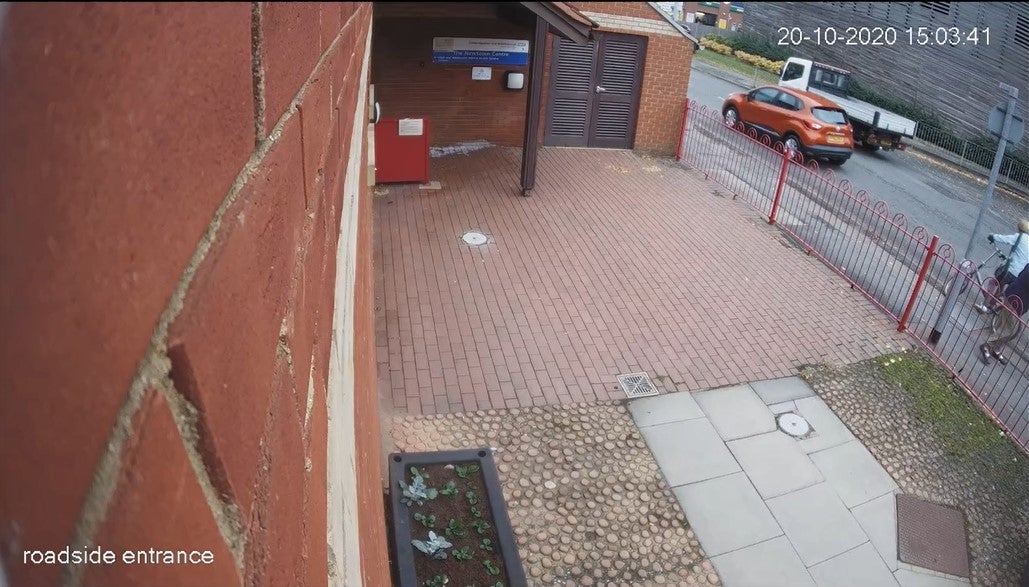 Screengrab taken from CCTV dated 20 October 2020 showing Auriol Grey walking on the pavement before causing Celia Ward to fall into the path of an oncoming vehicle