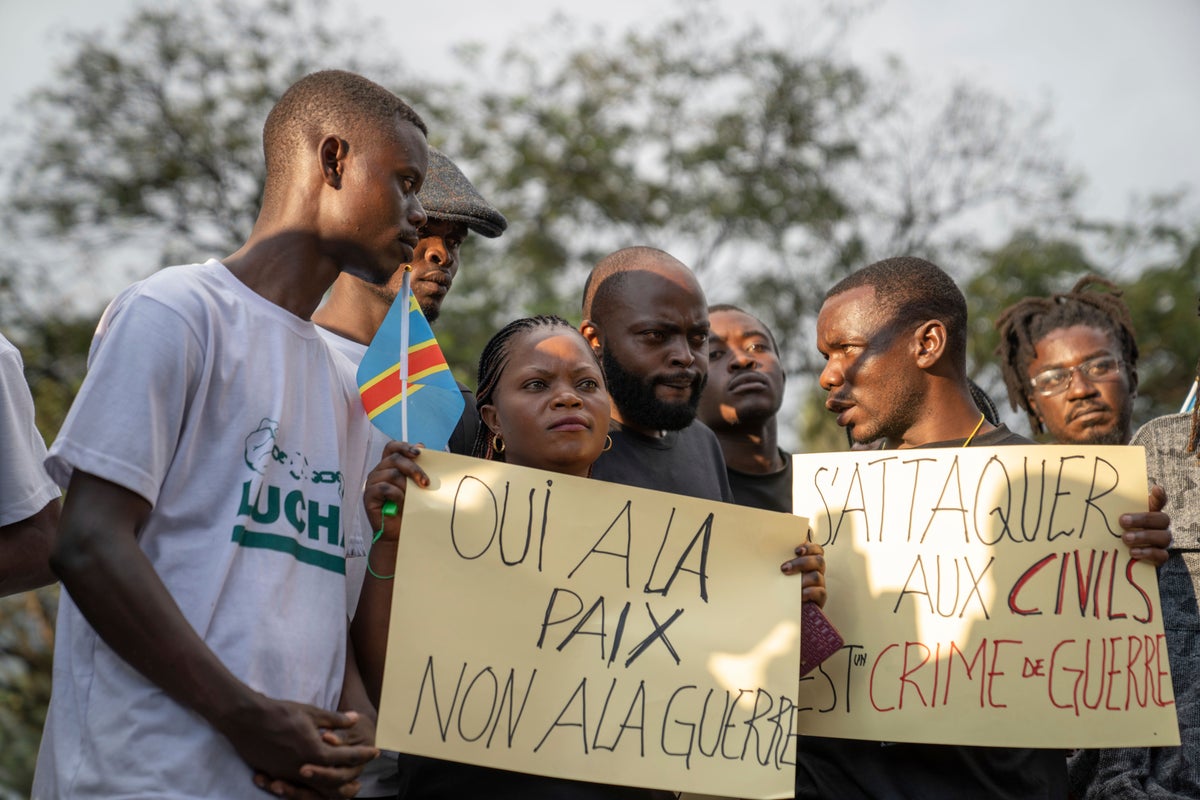 Families of the victims of attacks on displaced people in Congo mourn ...