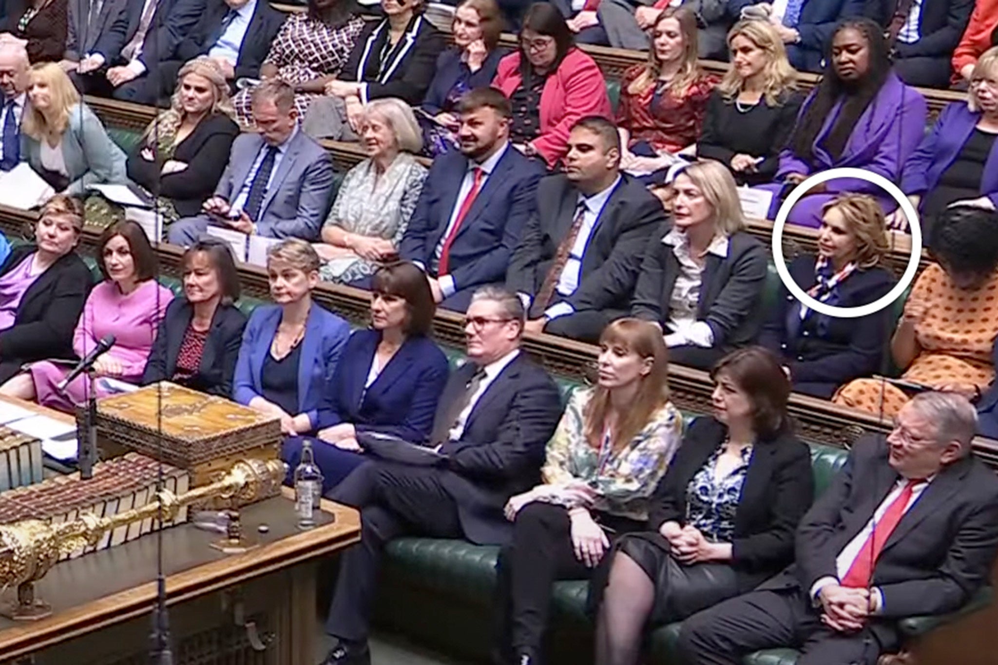 Natalie Elphicke sitting behind Sir Keir Starmer after walking away from the Tories