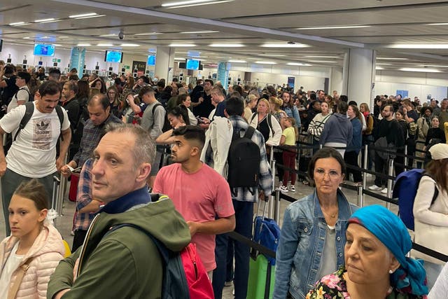 Delays at passport control (Paul Curievici/AP)