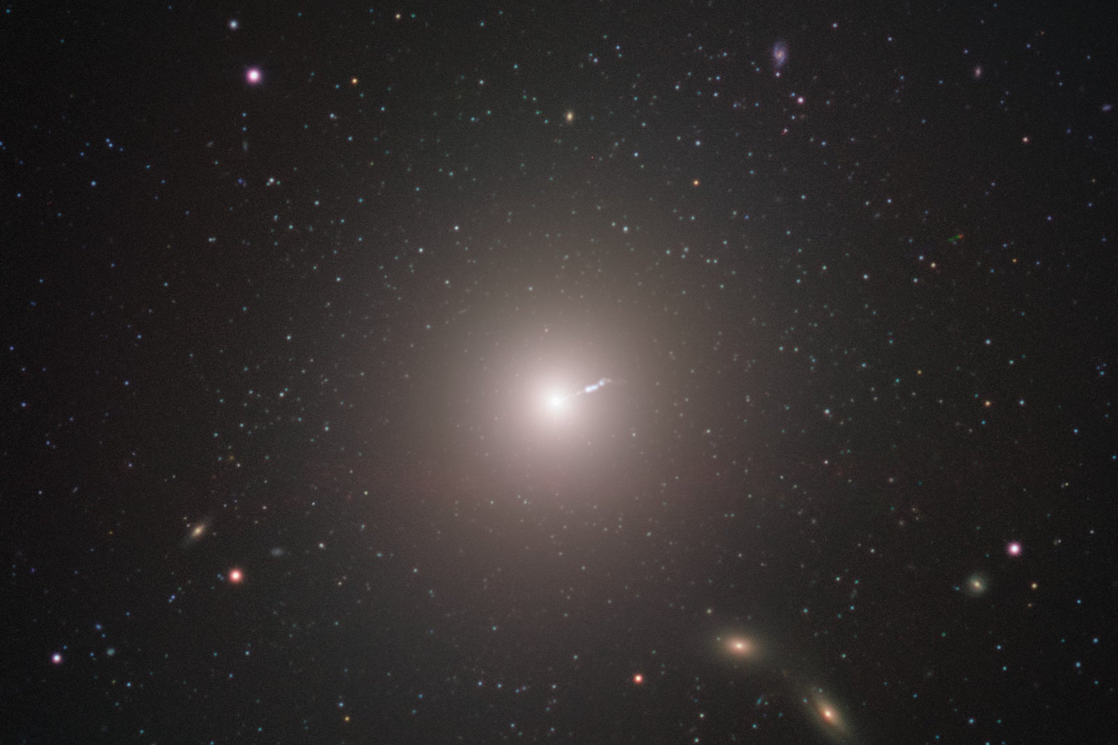 Messier 87 (M87) is an enormous elliptical galaxy