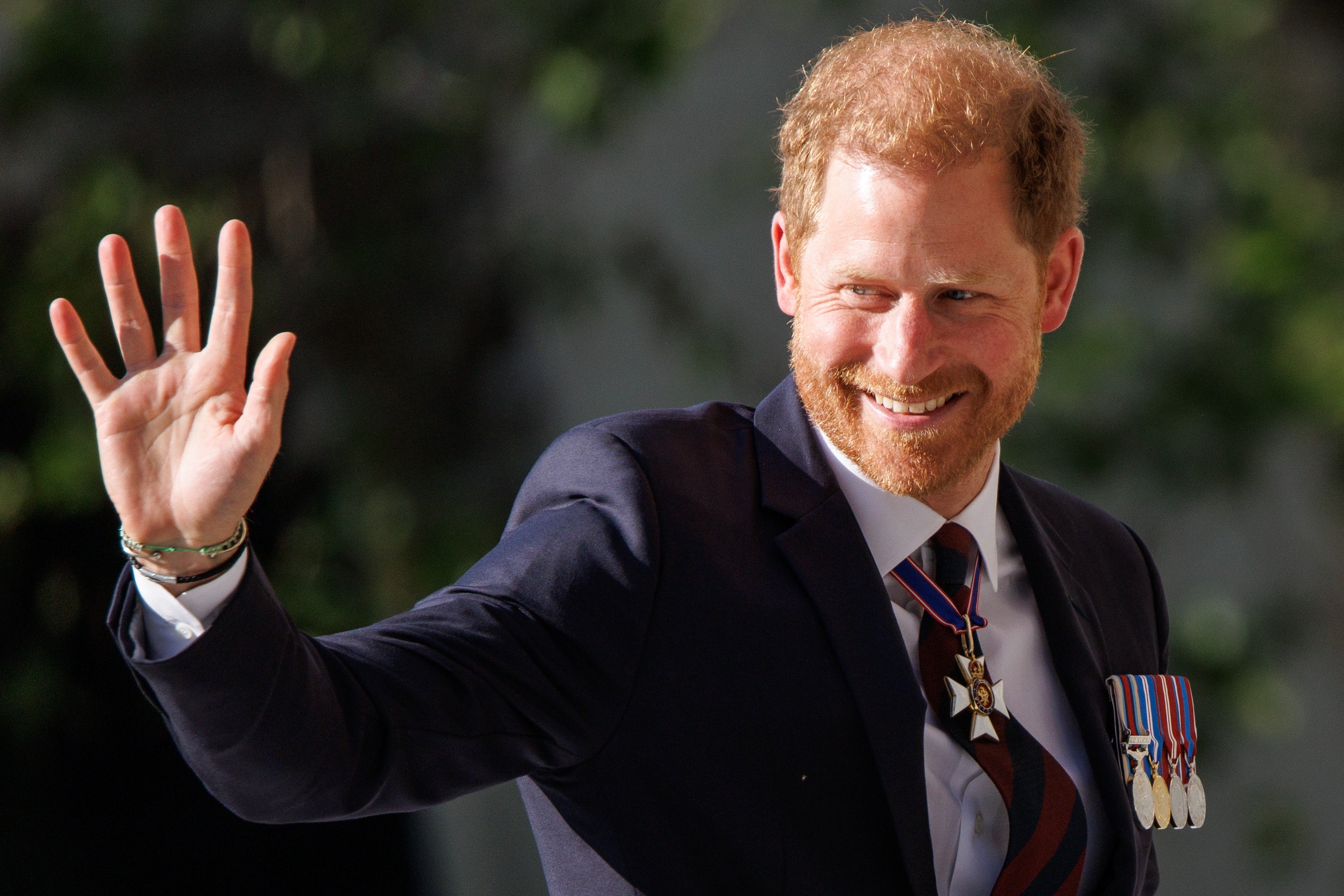 Prince Harry was all smiles as he arrived at the Invictus Games thanksgiving ceremony