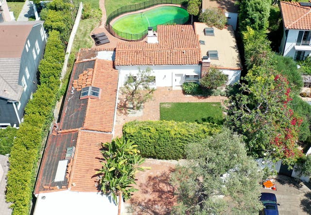 <p>An aerial view of Marilyn Monroe’s former home in Los Angeles, California. The current homeowners are suing the city for the right to demolish it</p>