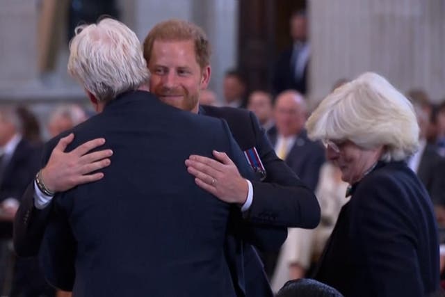 <p>Prince Harry hugs family as he is supported by Princess Diana’s brother and sister at Invictus Games ceremony.</p>
