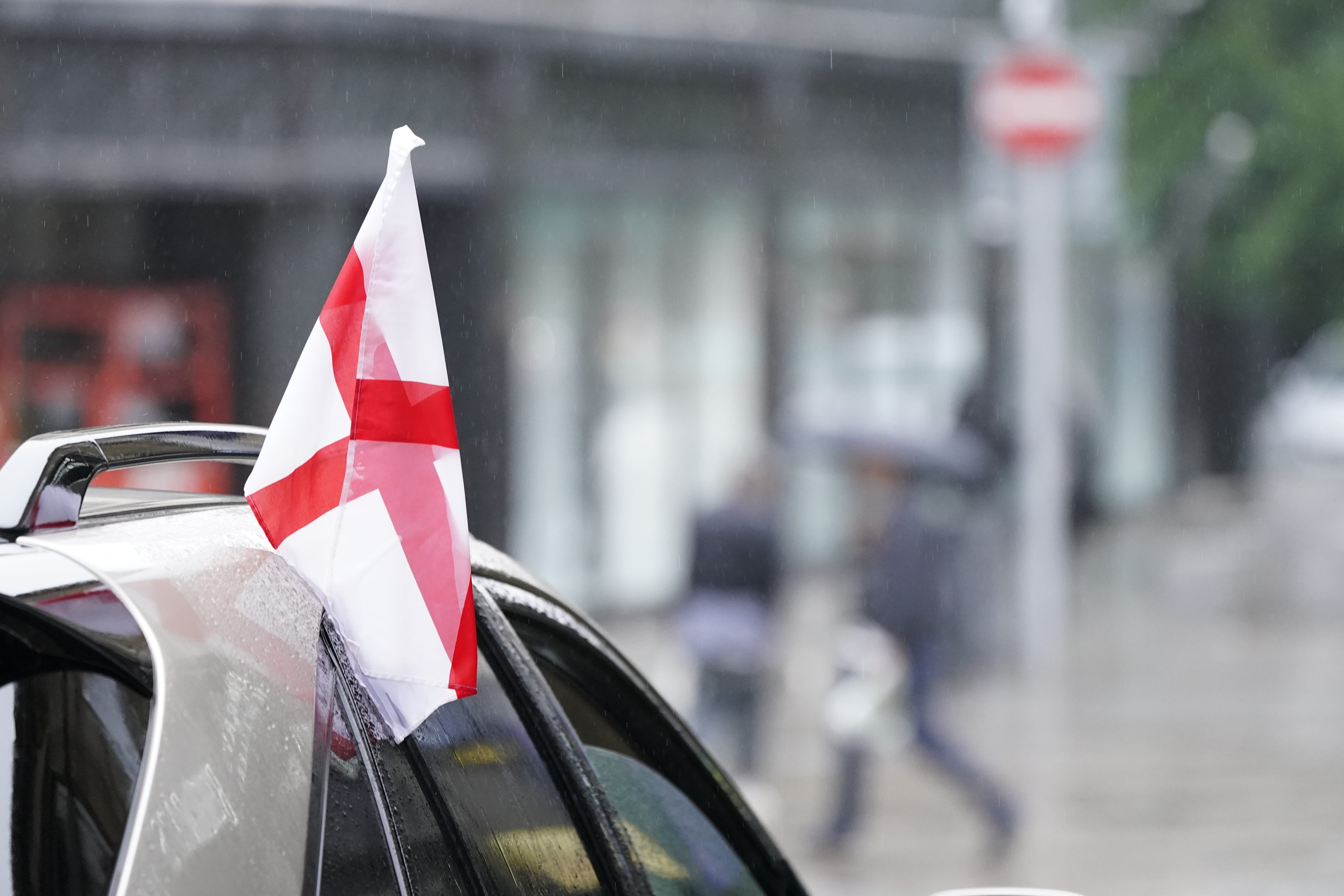 Flags can be flown from cars so long as they don’t obscure the driver’s view or pose a danger to pedestrians and other road users. (Danny Lawson/PA)