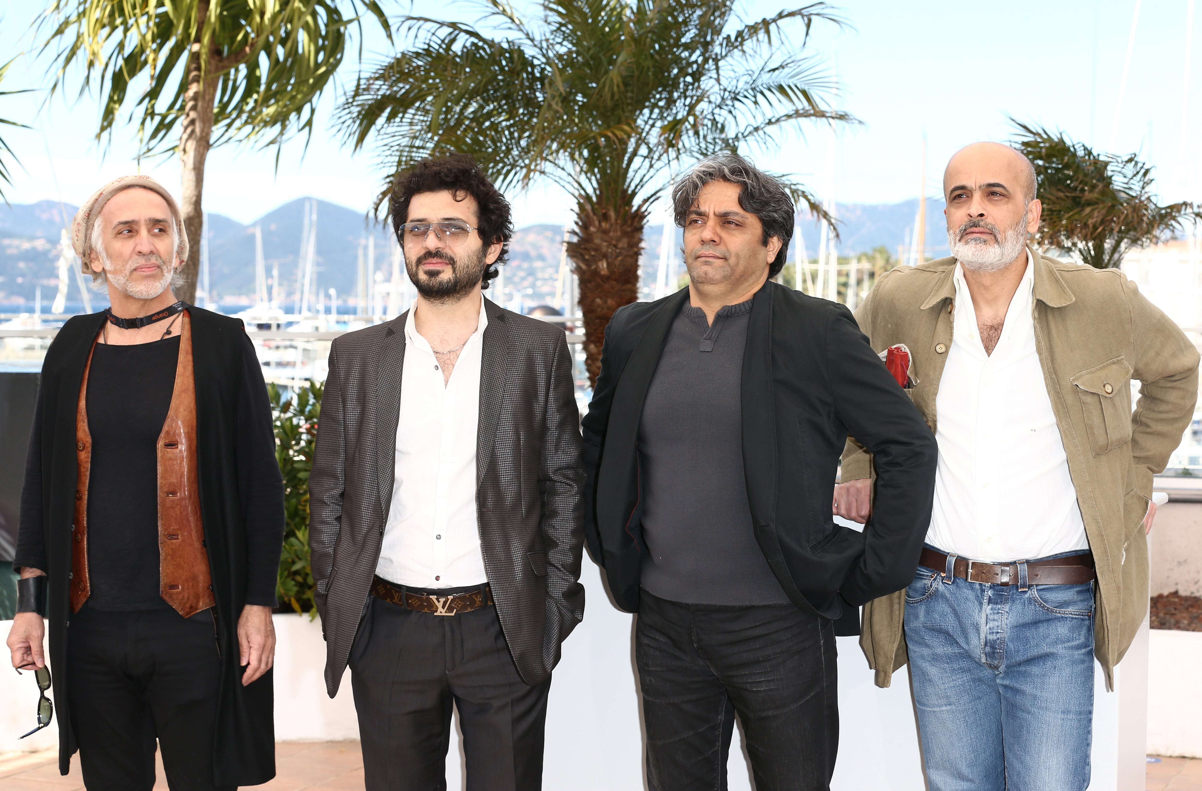 Mohammad Rasoulof (2nd from R) attends the photocall for ‘Dast-Neveshtehaa Nemisoosand’ during The 66th Annual Cannes Film Festival at Palais des Festivals on May 24, 2013 in Cannes