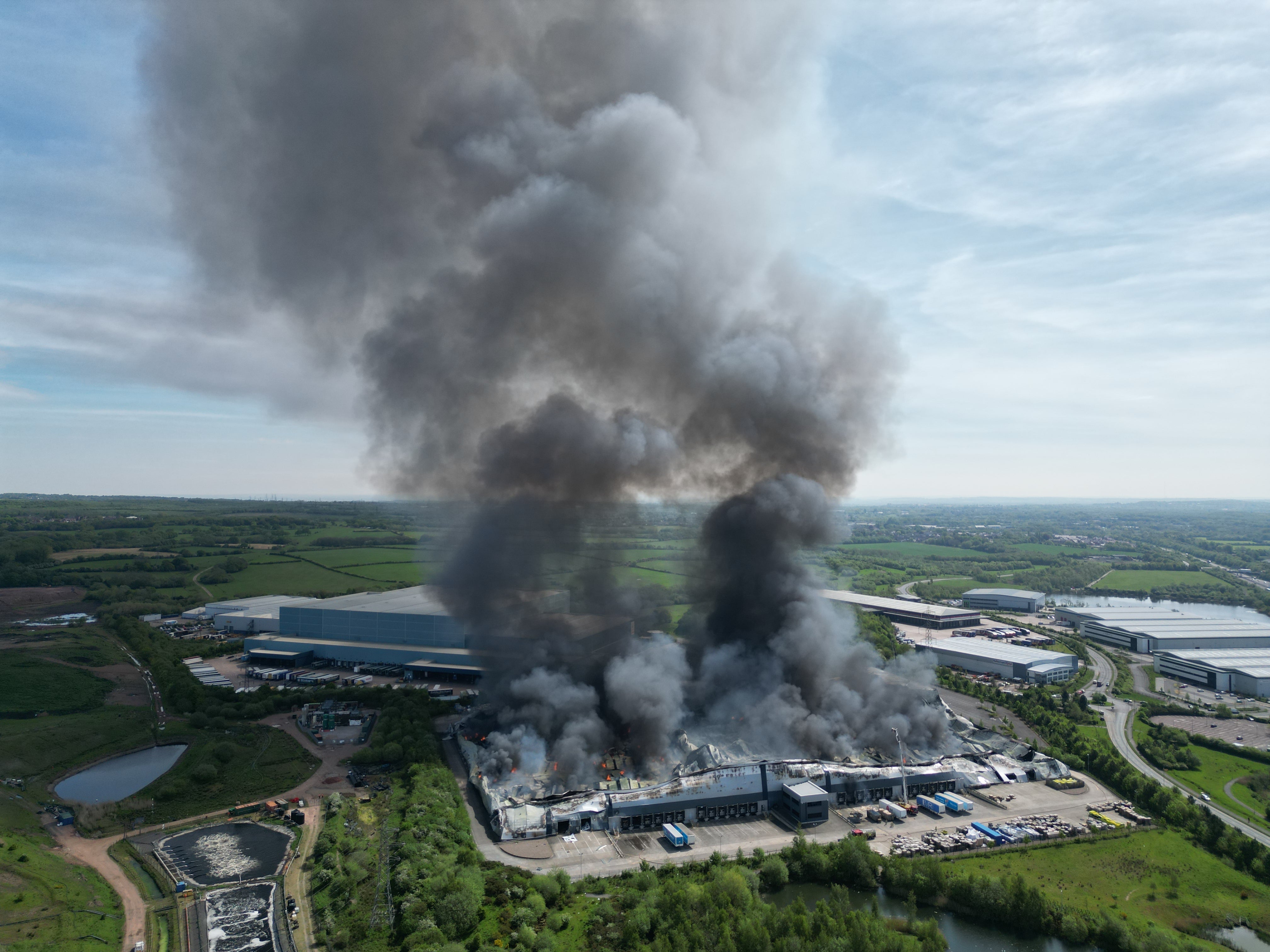A view taken from a drone of the fire at Super Smart Services near the A460 Orbital Island
