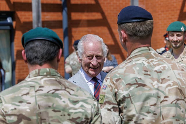 <p>The King during a visit to Gibraltar Barracks (Jonathan Buckmaster/Daily Express/PA)</p>