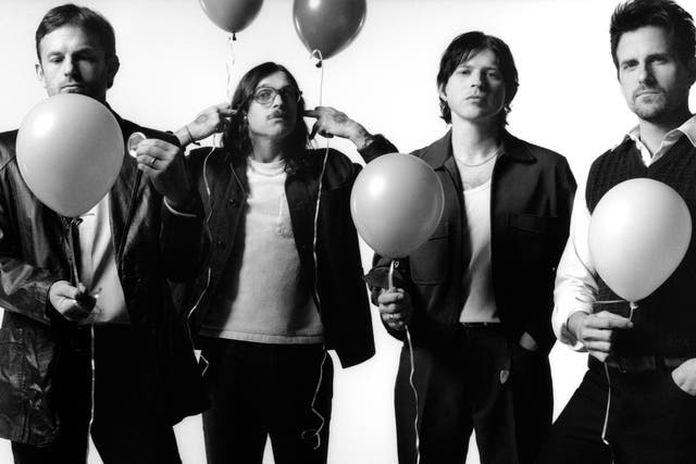 <p>Having a ball: Kings of Leon in promotional photos for their new album</p>
