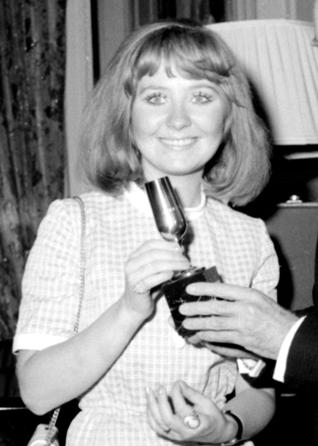 Lulu with her trophy after coming joint first in the Eurovision Song Contest