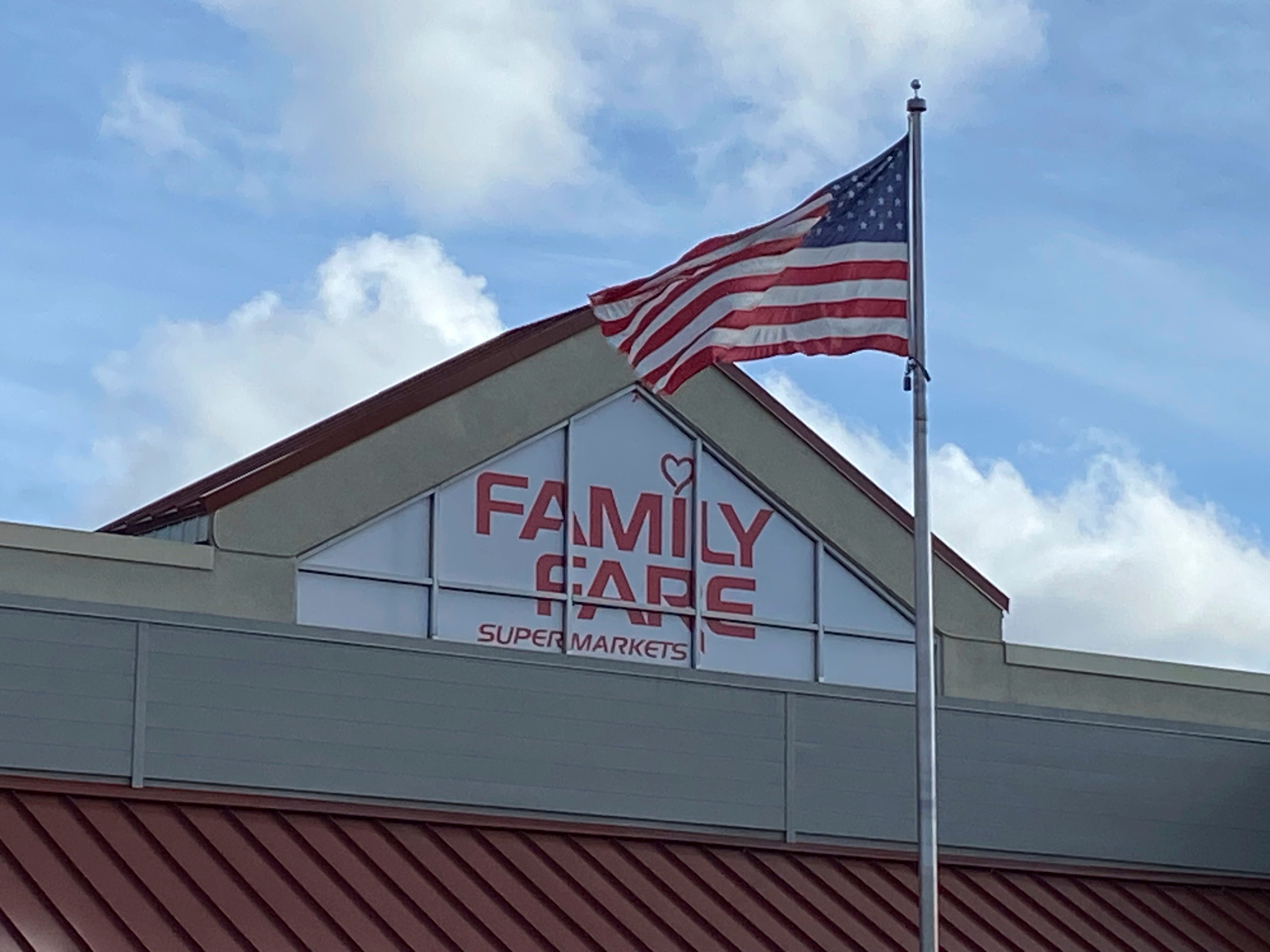 The woman, whose name was not released, was discovered inside the 5ft by 8ft triangle-shaped rooftop sign of the Family Fare grocery store on a retail strip in Midland, Michigan. The space was equipped with a computer, printer, mini desk and a Keurig coffee machine. She had been living there for roughly a year