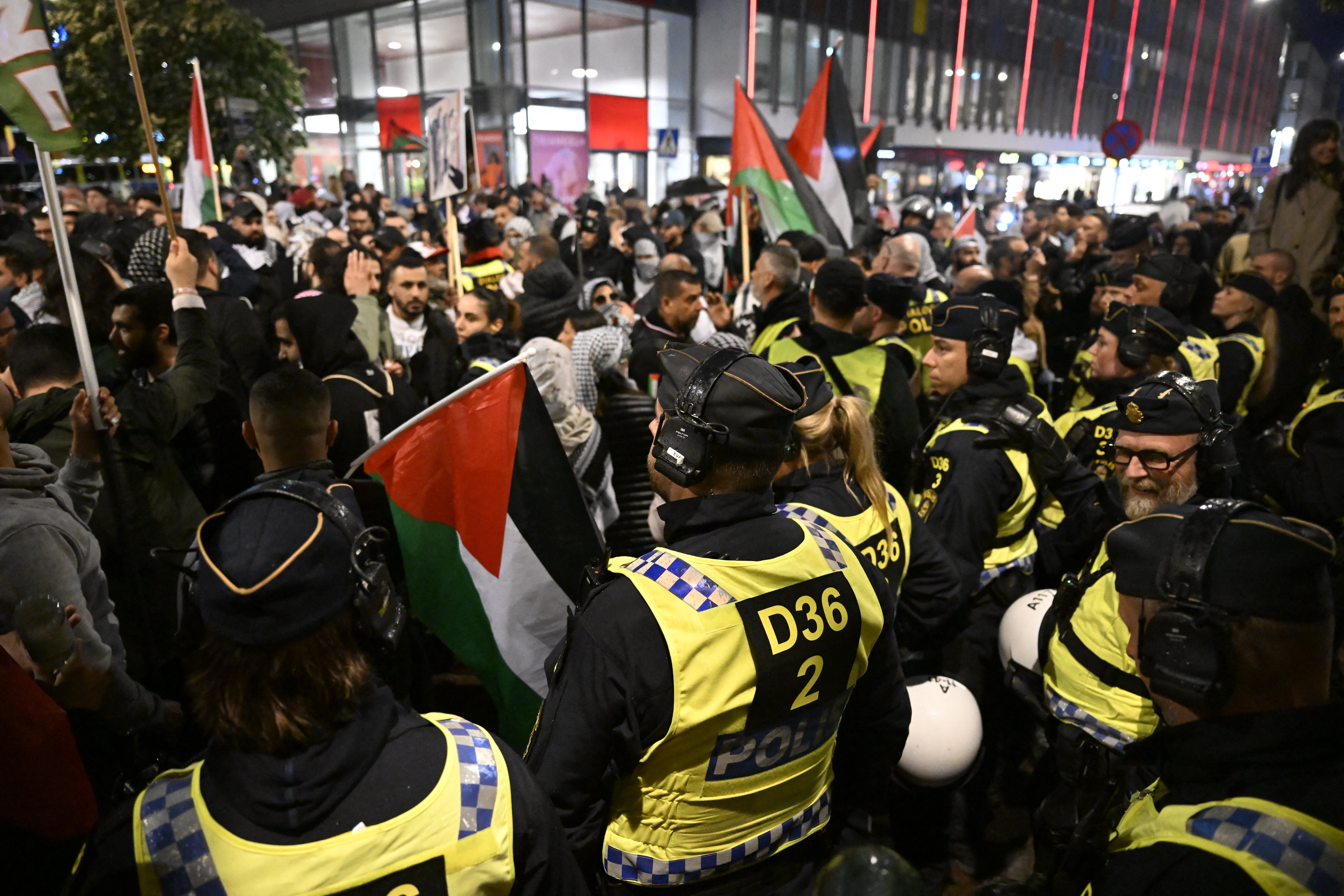 Police face pro-Palestinian protesters in Malmo during the Eurovision semi-final on 9 May 2024