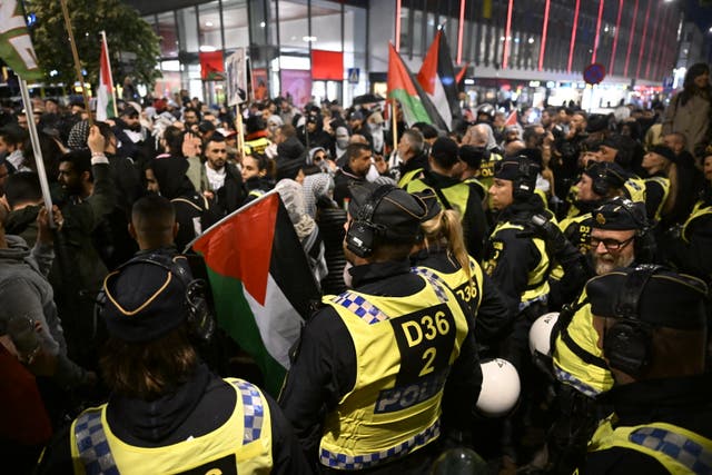 <p>Police face pro-Palestinian protesters in Malmo during the Eurovision semi-final on 9 May 2024</p>
