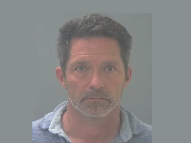 <p>Sean Hollonbeck, 54, of Santa Rosa County, Florida, was arrested and charged with aggravated assault and kidnapping after he held an Uber driver against his will with an AR-15</p>