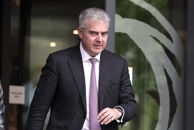 Sir Brandon Lewis leaving the Clayton Hotel in Belfast after giving evidence to the UK Covid-19 Inquiry hearing (Liam McBurney/PA)