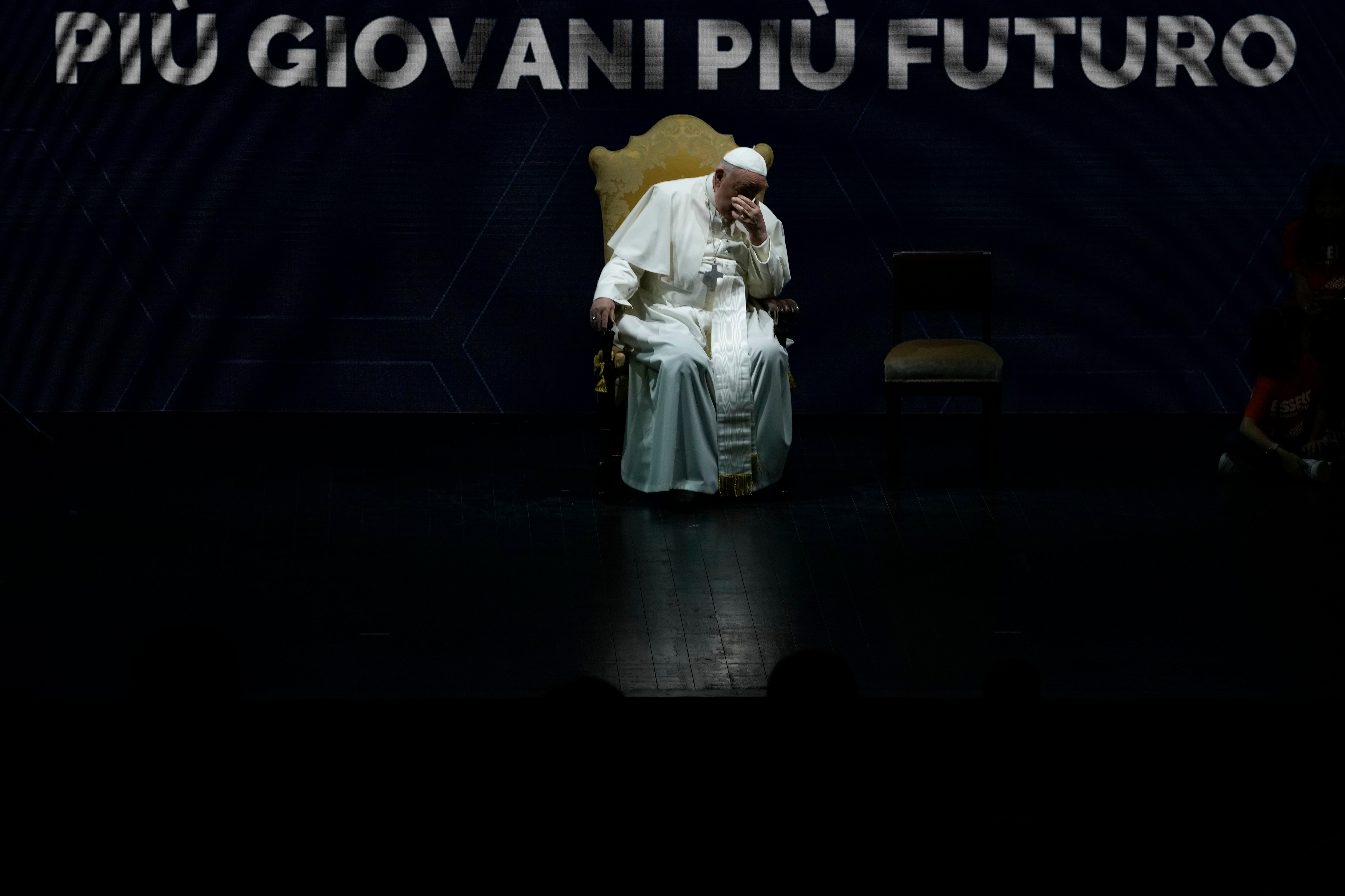 Pope Francis gestures as he sits during an annual gathering of pro-family organisations at the Auditorium della Conciliazione, in Rome, Friday, May 10, 2024