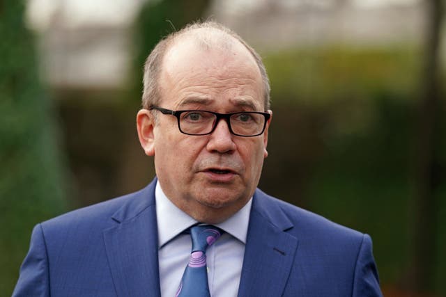 Northern Ireland’s chief medical officer (CMO) Sir Michael McBride talks to the media outside the Houben Centre in Belfast, after he received his Covid-19 booster jab. Picture date: Wednesday November 24, 2021.