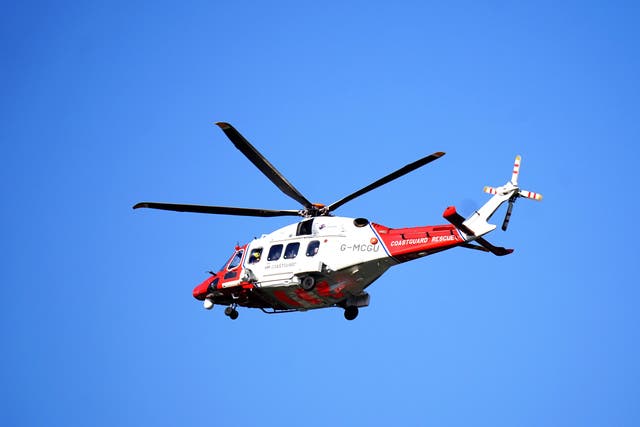 <p>A coastguard helicopter (Adam Davy/PA)</p>