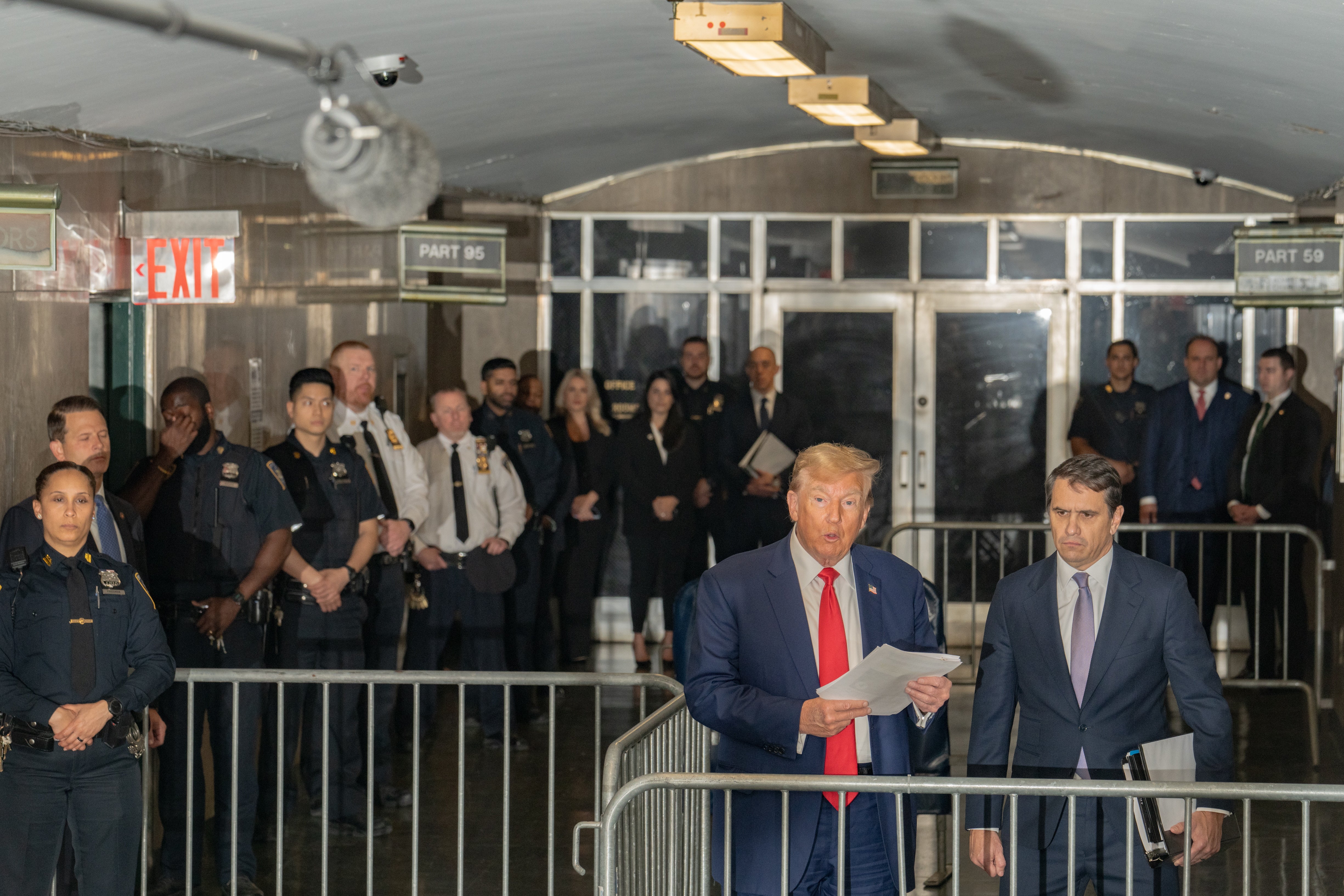 Donald Trump speaks to members of the media outside the courtroom on 10 May
