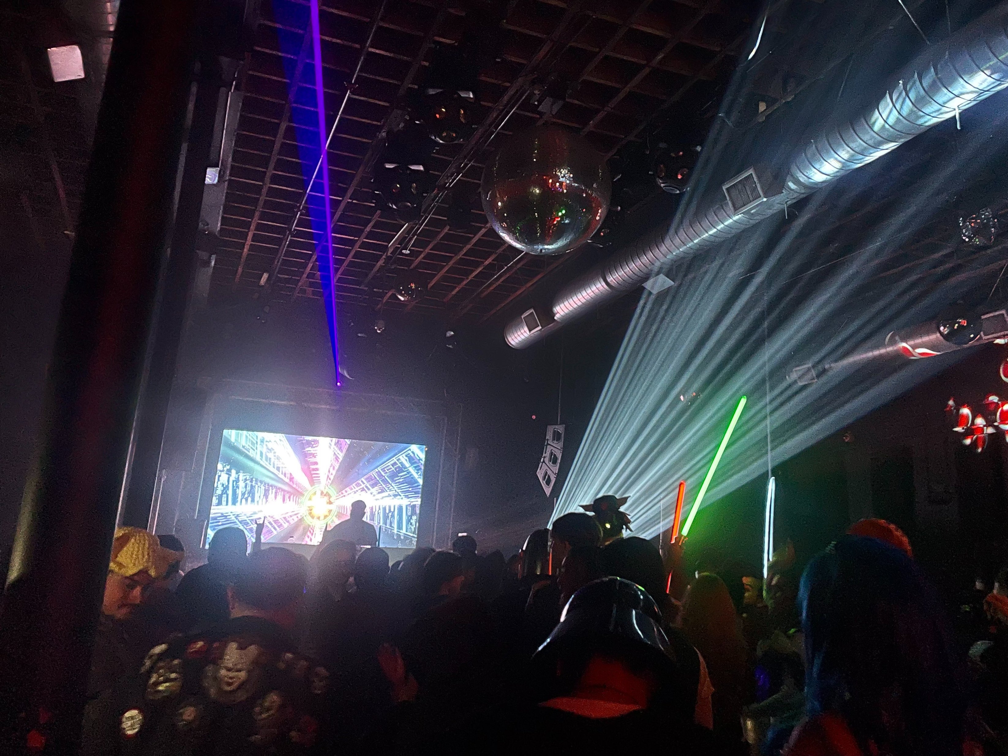 A DJ plays to a warehouse full of ‘Star Wars’ fans