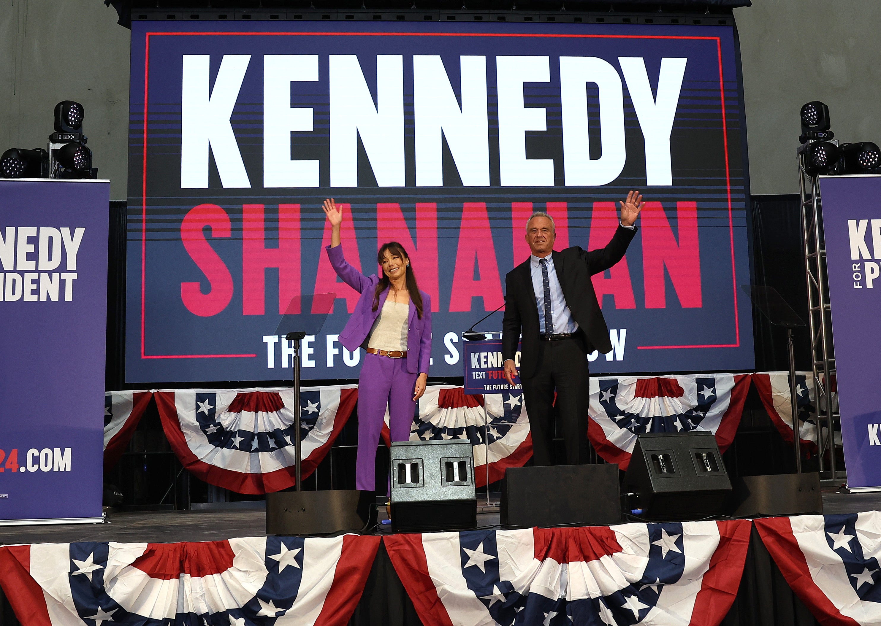 Nicole Shanahan (left) and Robert F Kennedy Jr (right) appear on stage together in March