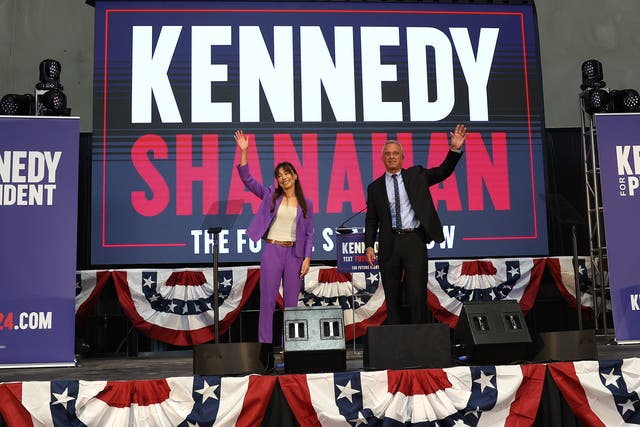 <p>Nicole Shanahan (left) and Robert F Kennedy Jr (right) appear on stage together in March </p>