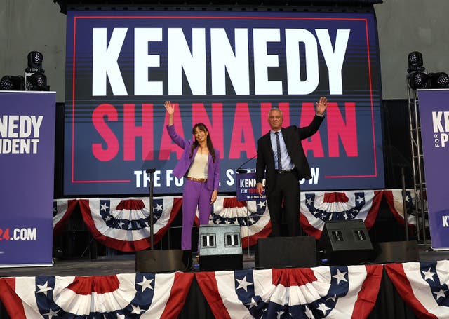 <p>Nicole Shanahan (left) and Robert F Kennedy Jr (right) appear on stage together in March </p>