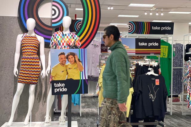 <p>A customer walks by a Pride Month merchandise display at a Target store on May 31, 2023 in San Francisco, California</p>