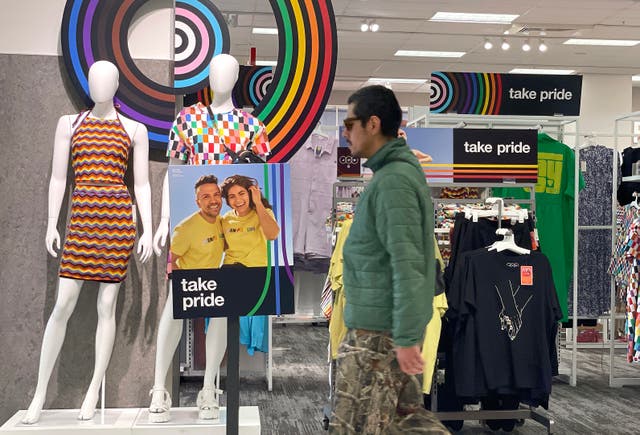 <p>A customer walks by a Pride Month merchandise display at a Target store in San Francisco, California in 2023 </p>