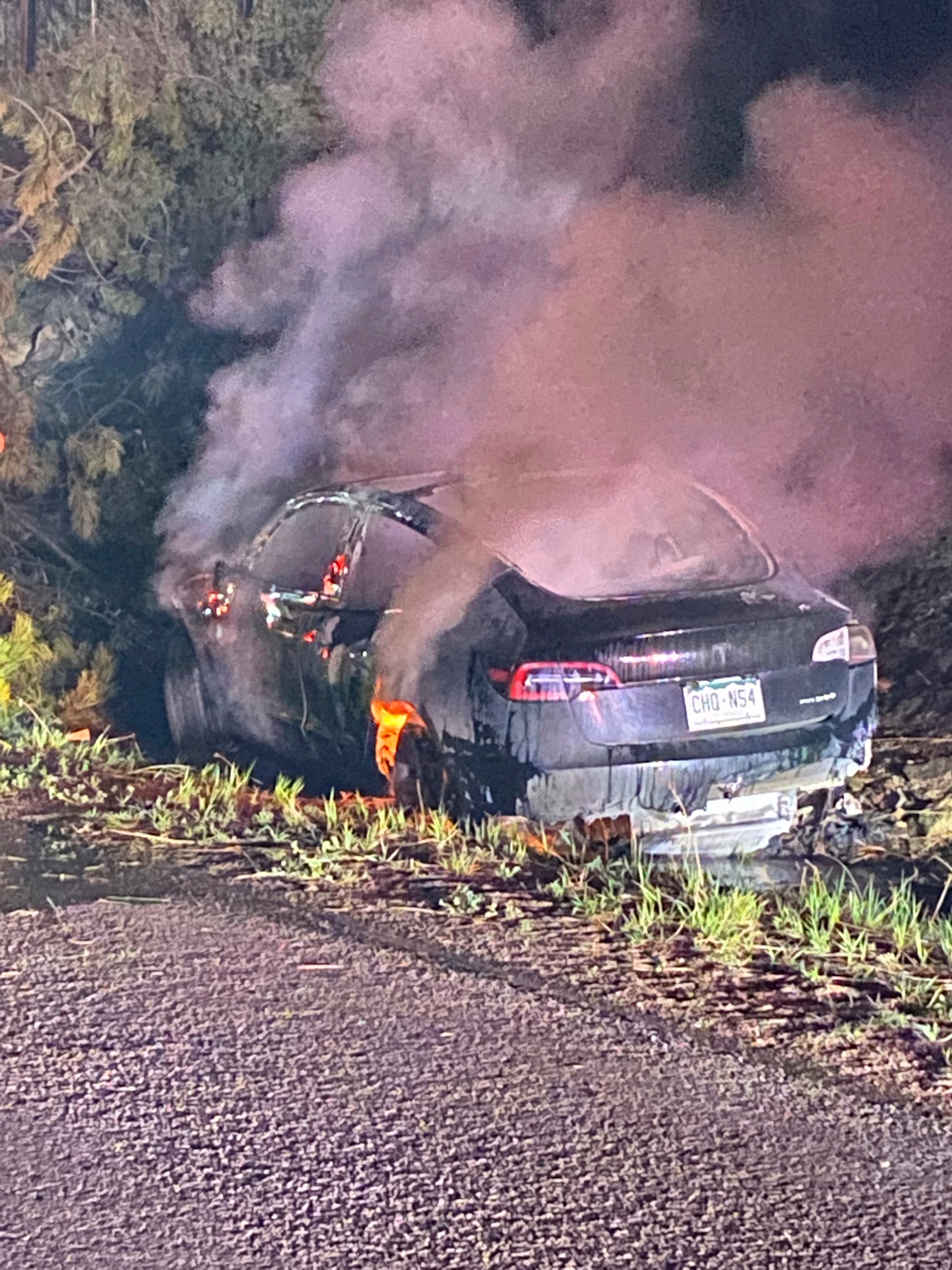 This image provided by Colorado State Patrol shows a Tesla Model 3 that crashed on May 16, 2022 in Clear Creek County, Colorado