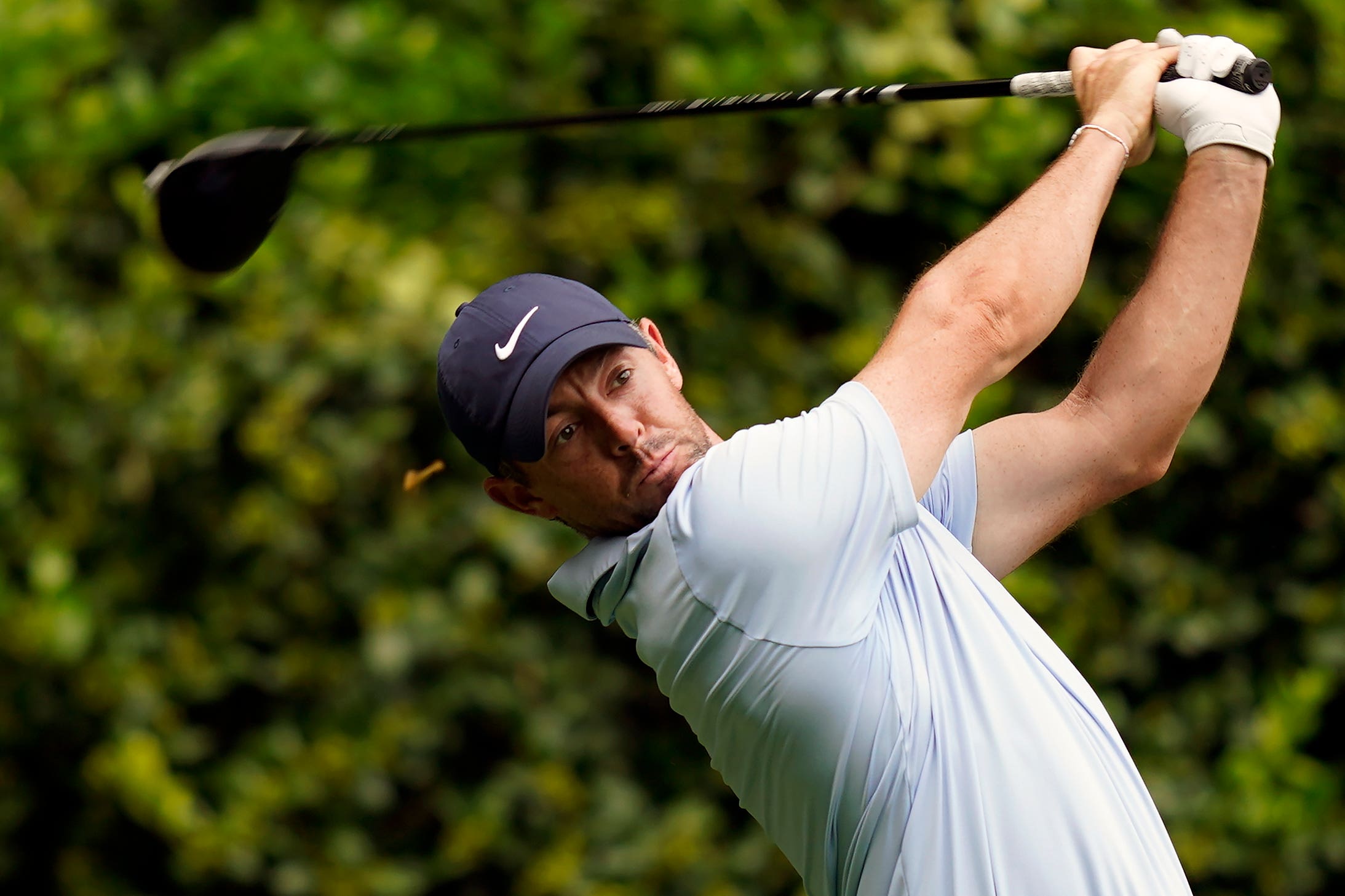 Rory McIlroy, of Northern Ireland, watches his tee shot on the 12th hole during the second round of the Wells Fargo Championship golf tournament at Quail Hollow Friday, May 10, 2024, in Charlotte, North Carolina (Erik Verduzco/AP)