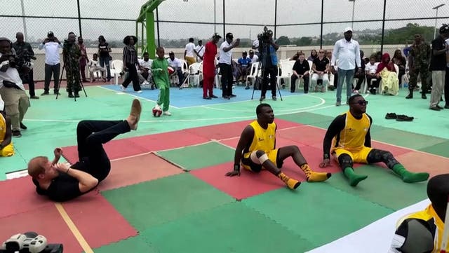 <p>Prince Harry enjoys game of sitting volleyball as Meghan cheers him on during Nigeria visit.</p>