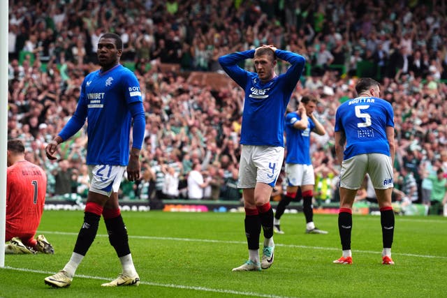 <p>John Lundstram scored an own own goal and was later sent off for Rangers </p>