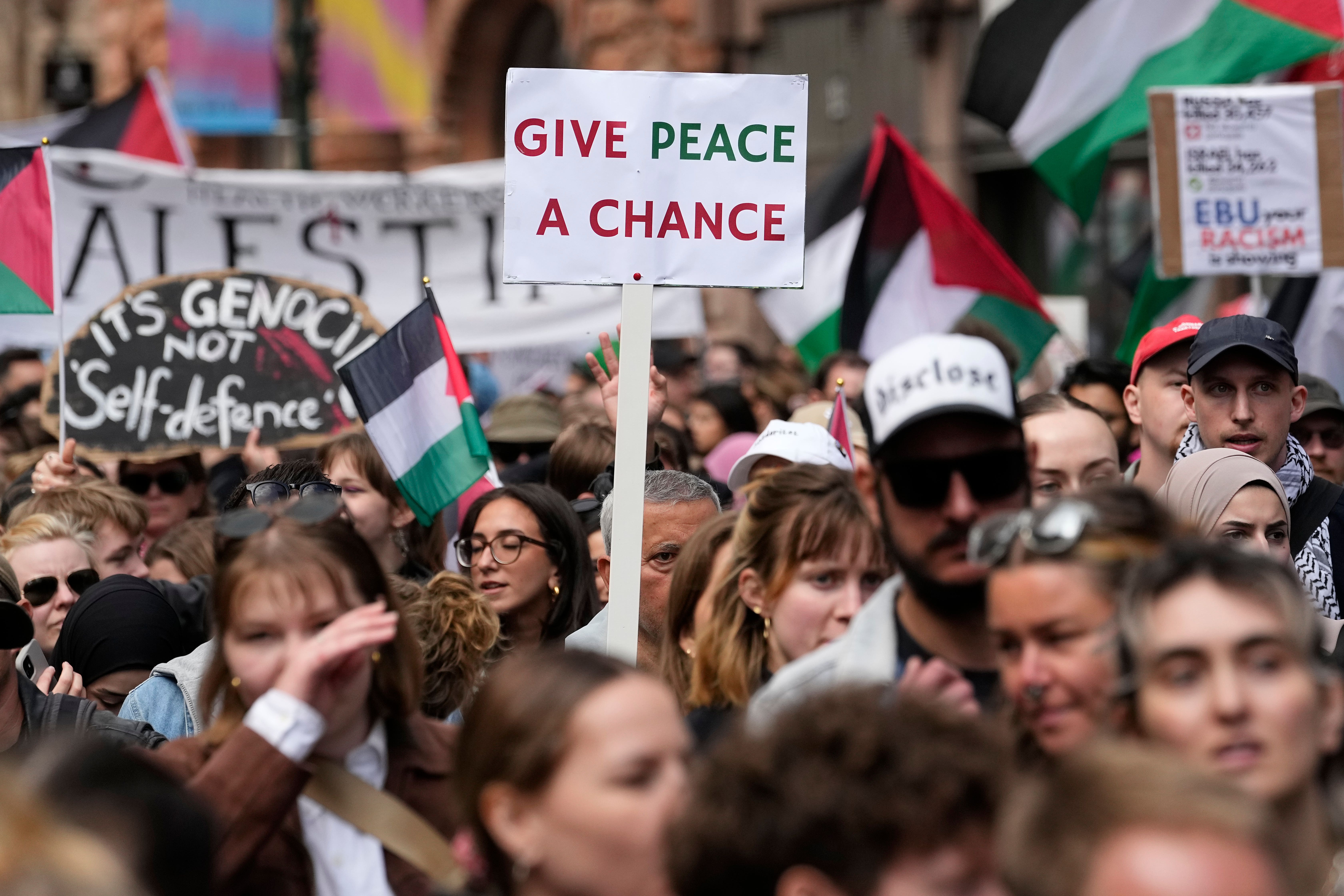 <p>Pro-Palestinian demonstrators march during a protest against the participation of Israeli contestant Eden Golan (Martin Meissner/AP)</p>