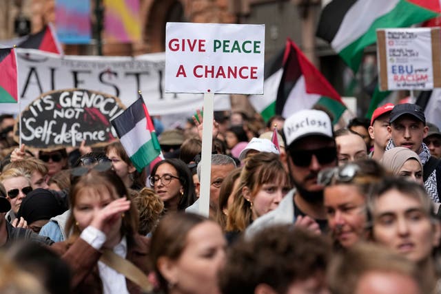 <p>Pro-Palestinian demonstrators march during a protest against the participation of Israeli contestant Eden Golan (Martin Meissner/AP)</p>