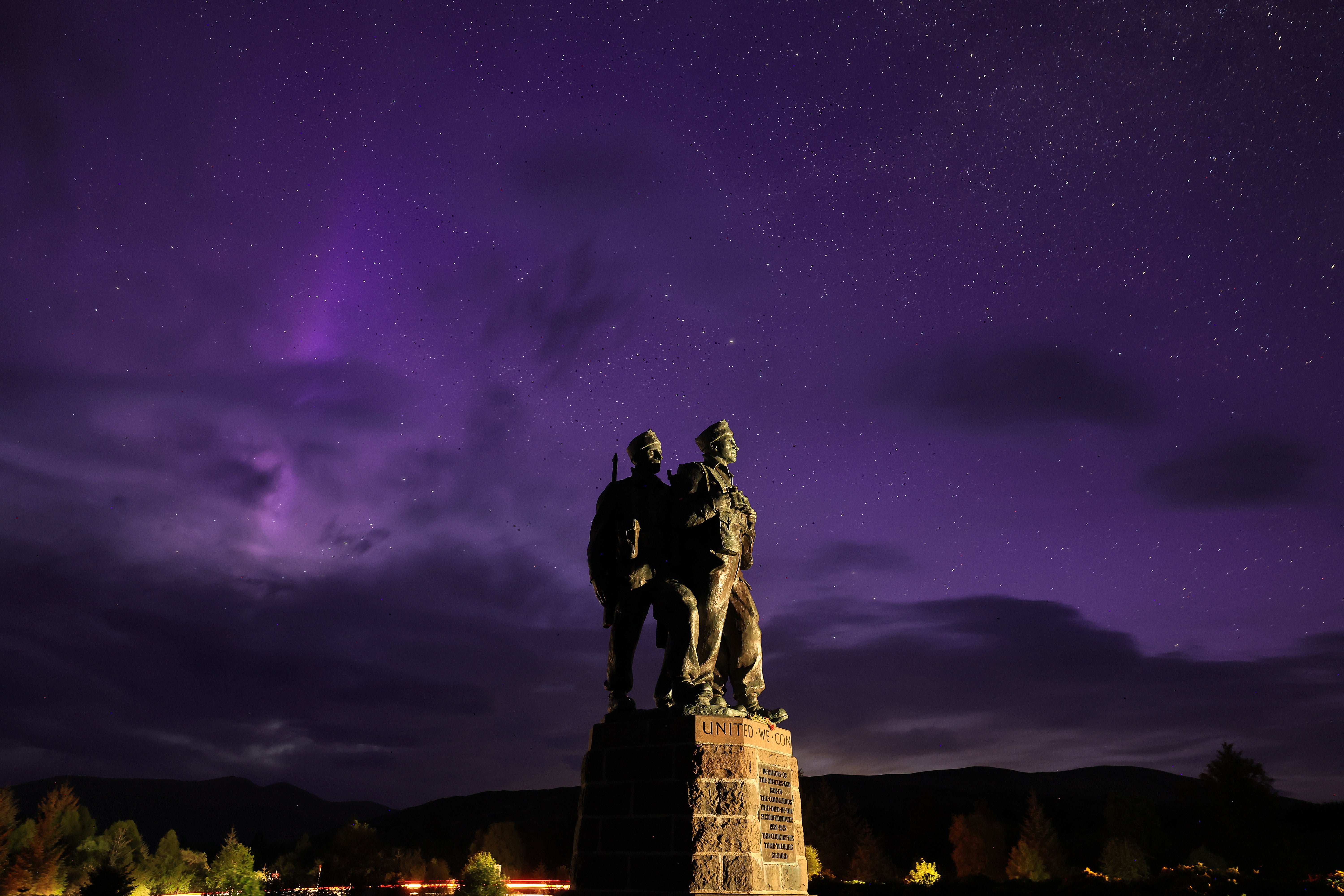 The Commando Memorial in Spean Bridge, Scotland as the aurora borealis, commonly known as the northern lights, are visible in the early hours on Sunday 12 May