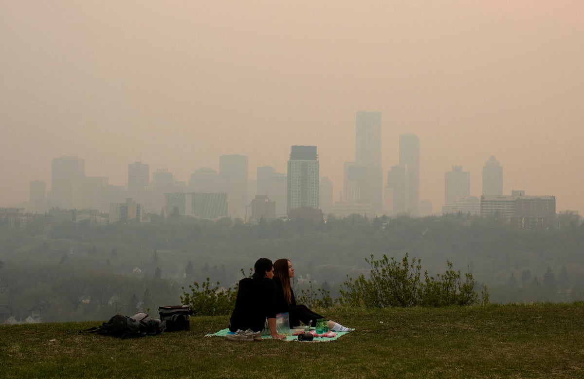 Wildfire in Canada’s British Columbia forces thousands to evacuate. Winds push smoke into Alberta