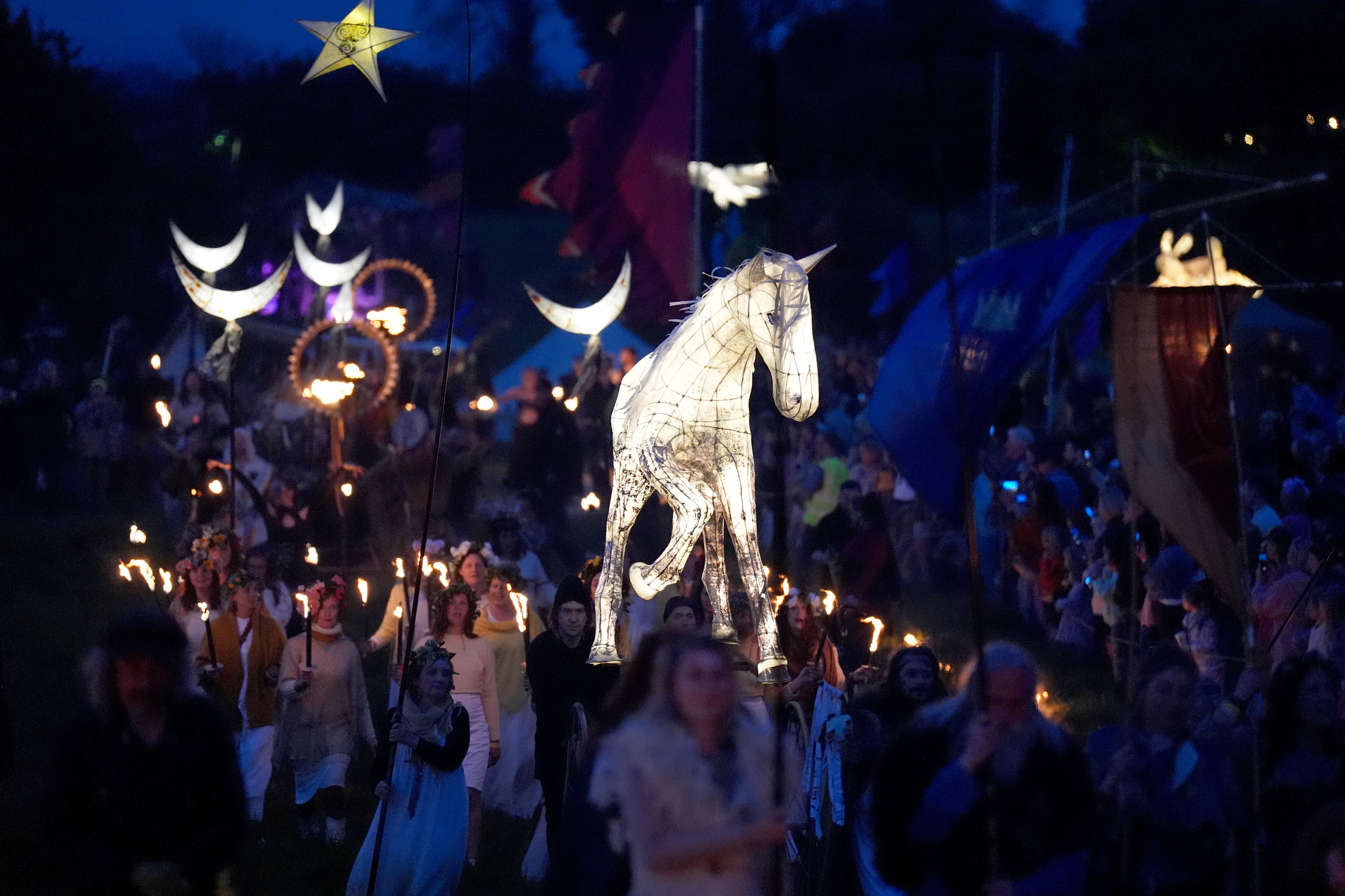 A parade during the Bealtaine Fire Festival at the Hill of Uisneach in Co Westmeath (Niall Carson/PA)