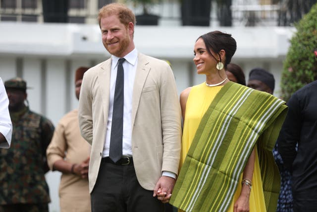 <p>Harry and Meghan, the Duke and Duchess of Sussex, in Lagos during their private tour of Nigeria </p>