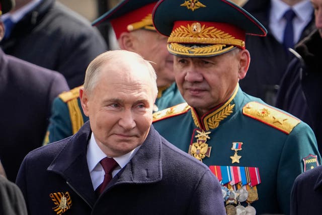 <p>Vladimir Putin has proposed removing Russian defence minister Sergei Shoigu (right) from his post</p>