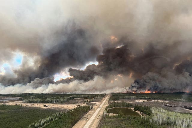 <p>More than 3,000 people in the town of Fort Nelson, British Columbia, have been ordered to evacuate by Canadian authorities after the first major wildfire of the year ripped through the province </p>