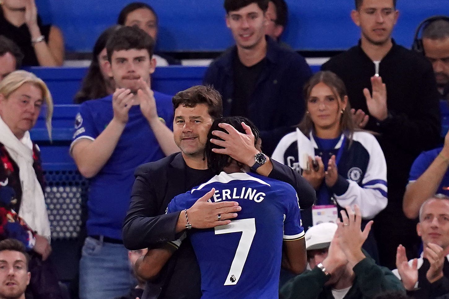 Chelsea manager Mauricio Pochettino with Raheem Sterling after he is substituted during the Premier League match at Stamford Bridge, London. Picture date: Friday August 25, 2023.