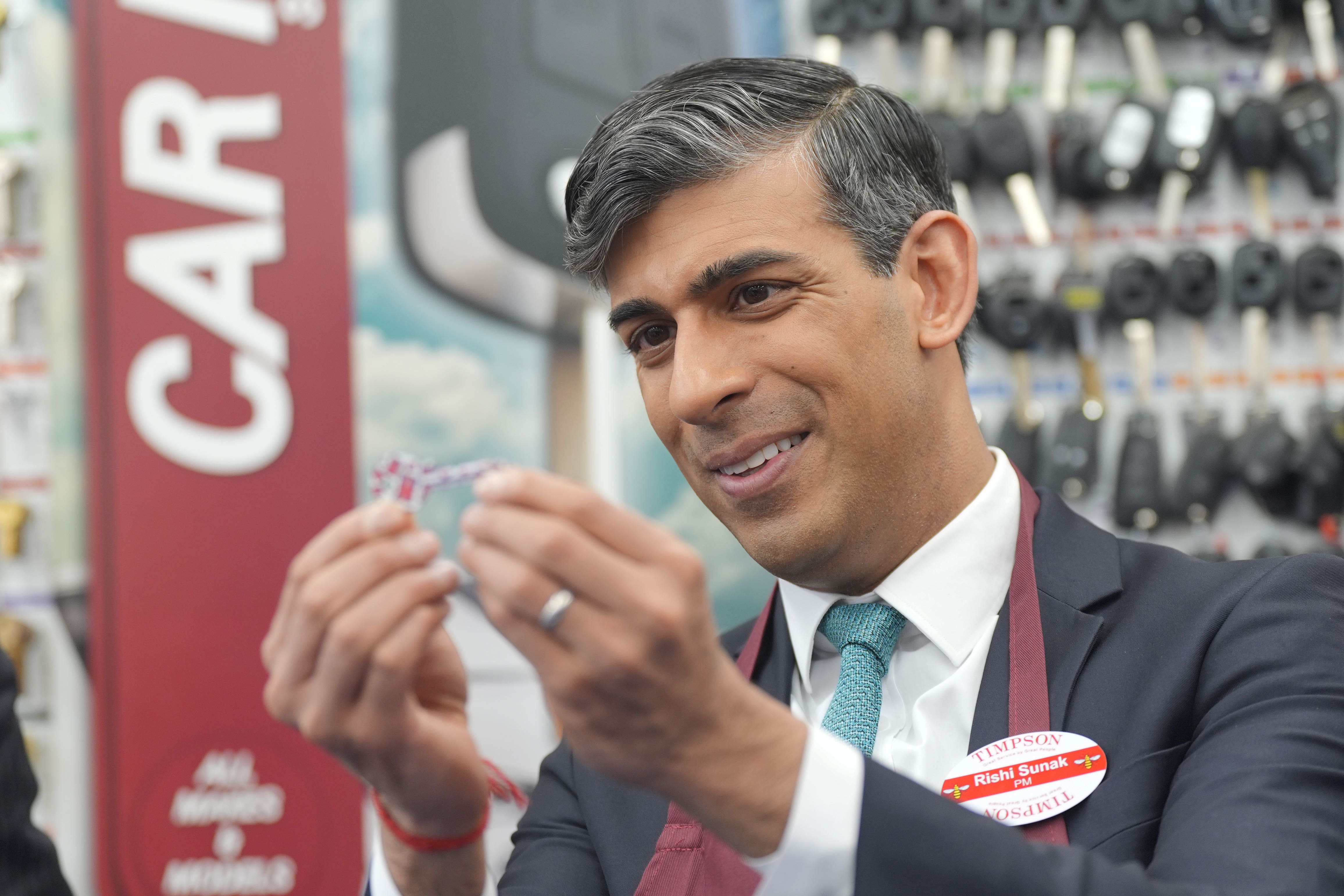 Prime Minister Rishi Sunak during a visit to a branch of Timpson (Yui Mok/PA)