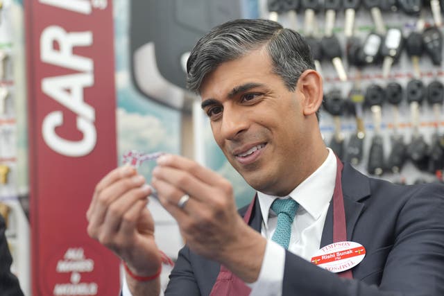 <p>Prime Minister Rishi Sunak during a visit to a branch of Timpson (Yui Mok/PA)</p>