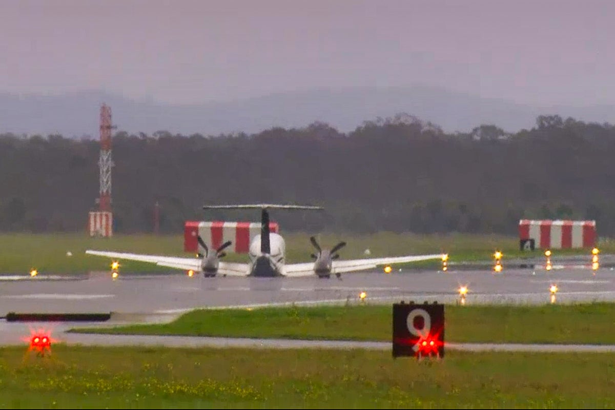 Plane makes emergency landing without landing gear after circling for 4 hours in Newcastle airport drama