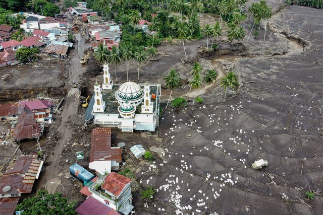<p>An aerial photo shows the aftermath of flash floods in Tanah Datar, West Sumatra, Indonesia </p>