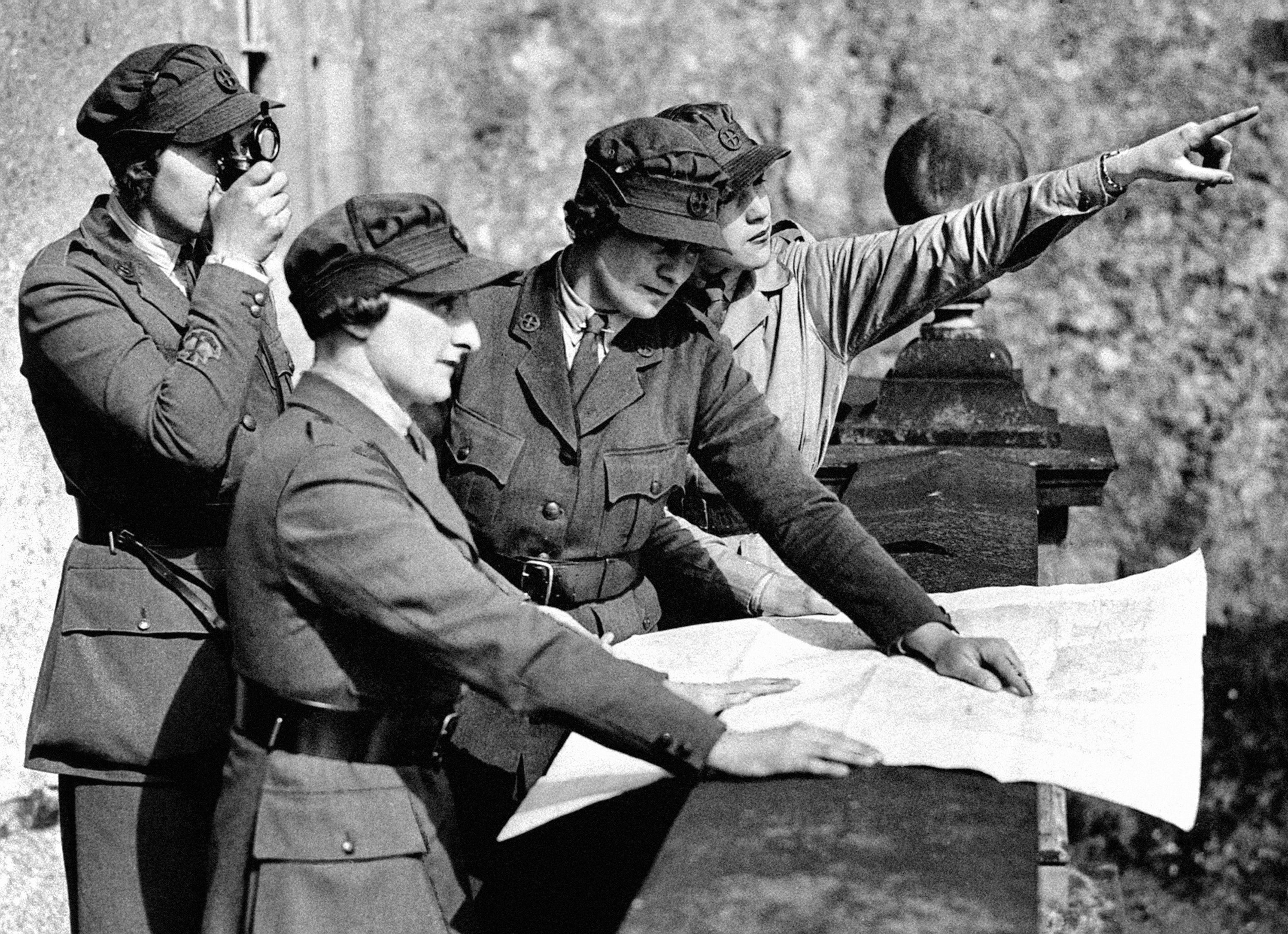 Members of the Women’s Transport Service (Northern Ireland Section) taking compass bearings from the terrace of Killyleagh Castle, County Down, Northern Ireland
