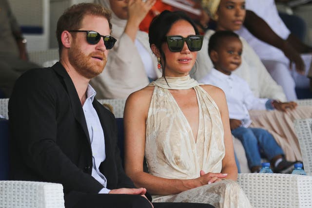 <p>The Duke and Duchess of Sussex attend a polo fundraiser event in Lagos, Nigeria, over the weekend </p>