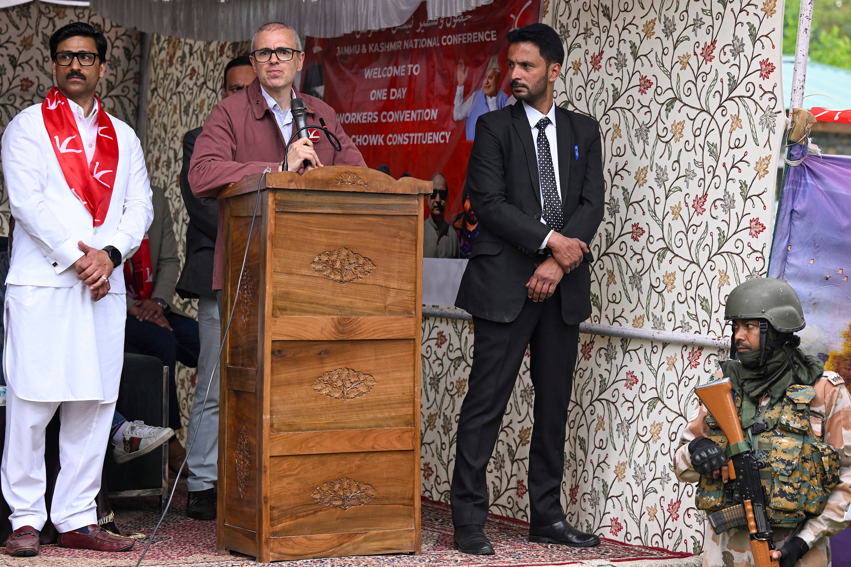 Jammu and Kashmir National Conference (NC) leader and former Jammu and Kashmir Chief Minister Omar Abdullah (C) addresses a public meeting in Srinagar